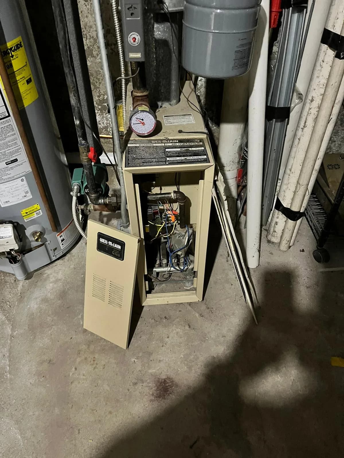 Boiler control cabinet opened for an annual maintenance inspection