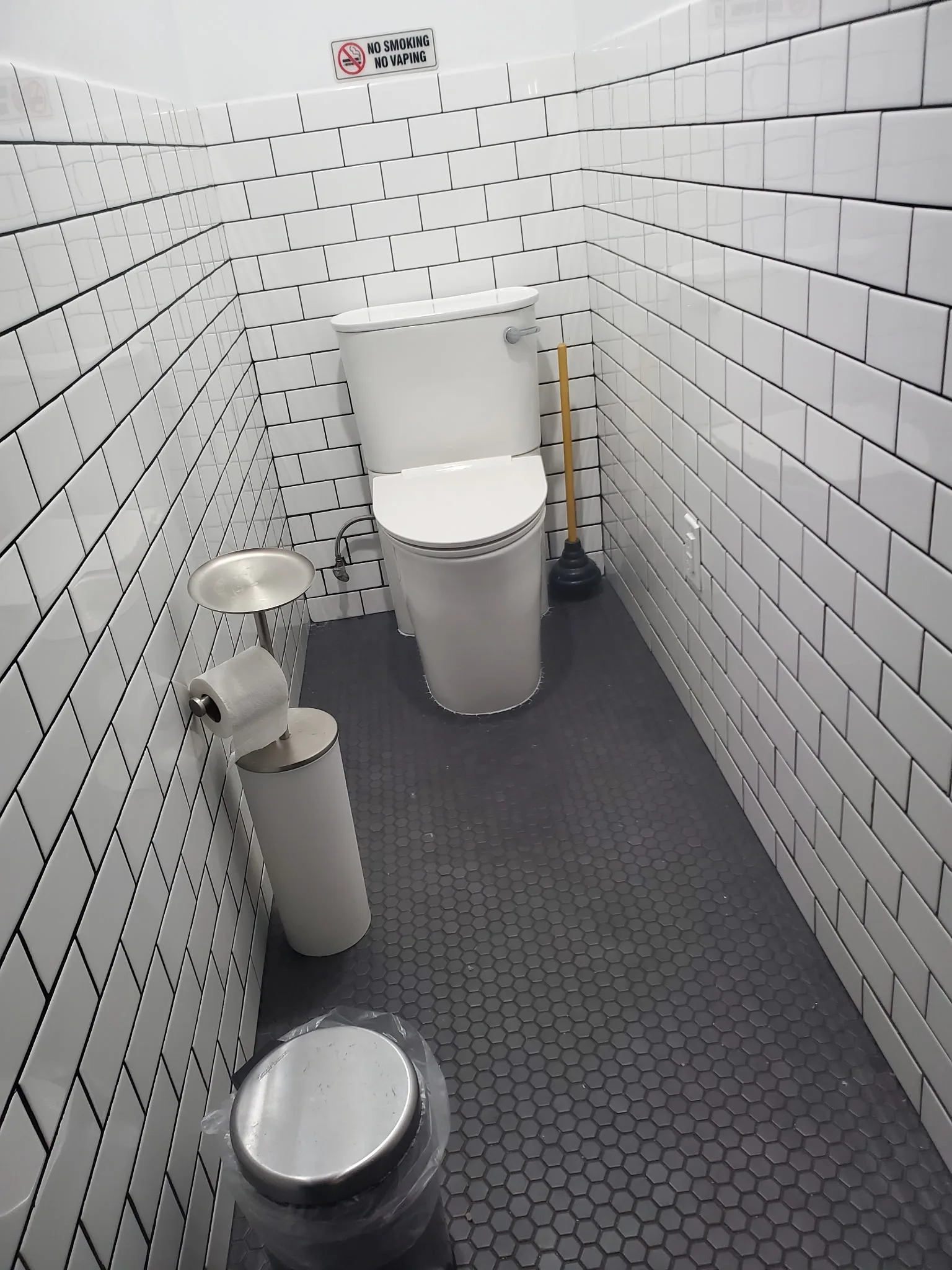 Completed toilet installation in a tiled bathroom